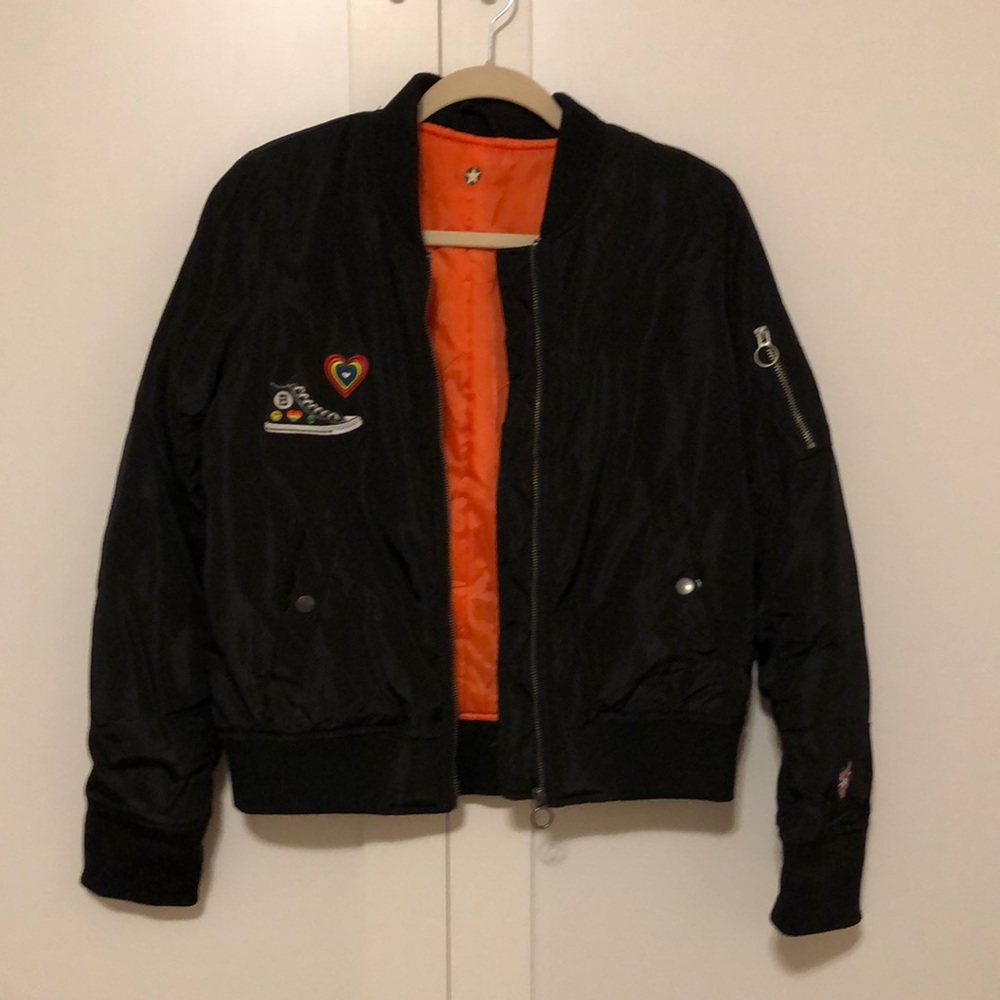 Max and Gino’s puffy black bomber jacket w/patches